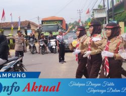 Polsek Kalirejo Amankan Lomba Gerak Jalan Tingkat Pelajar dalam Rangka HUT RI ke-80