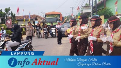 Polsek Kalirejo Amankan Lomba Gerak Jalan Tingkat Pelajar dalam Rangka HUT RI ke-80
